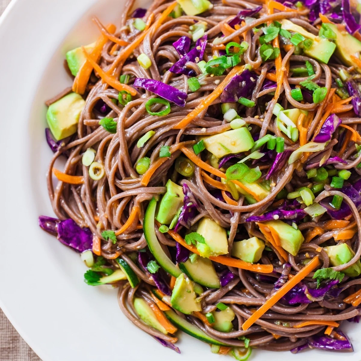 Japanese-inspired Sesame Avocado and Soba Noodle Salad served cold as a refreshing vegan lunch or light side dish.