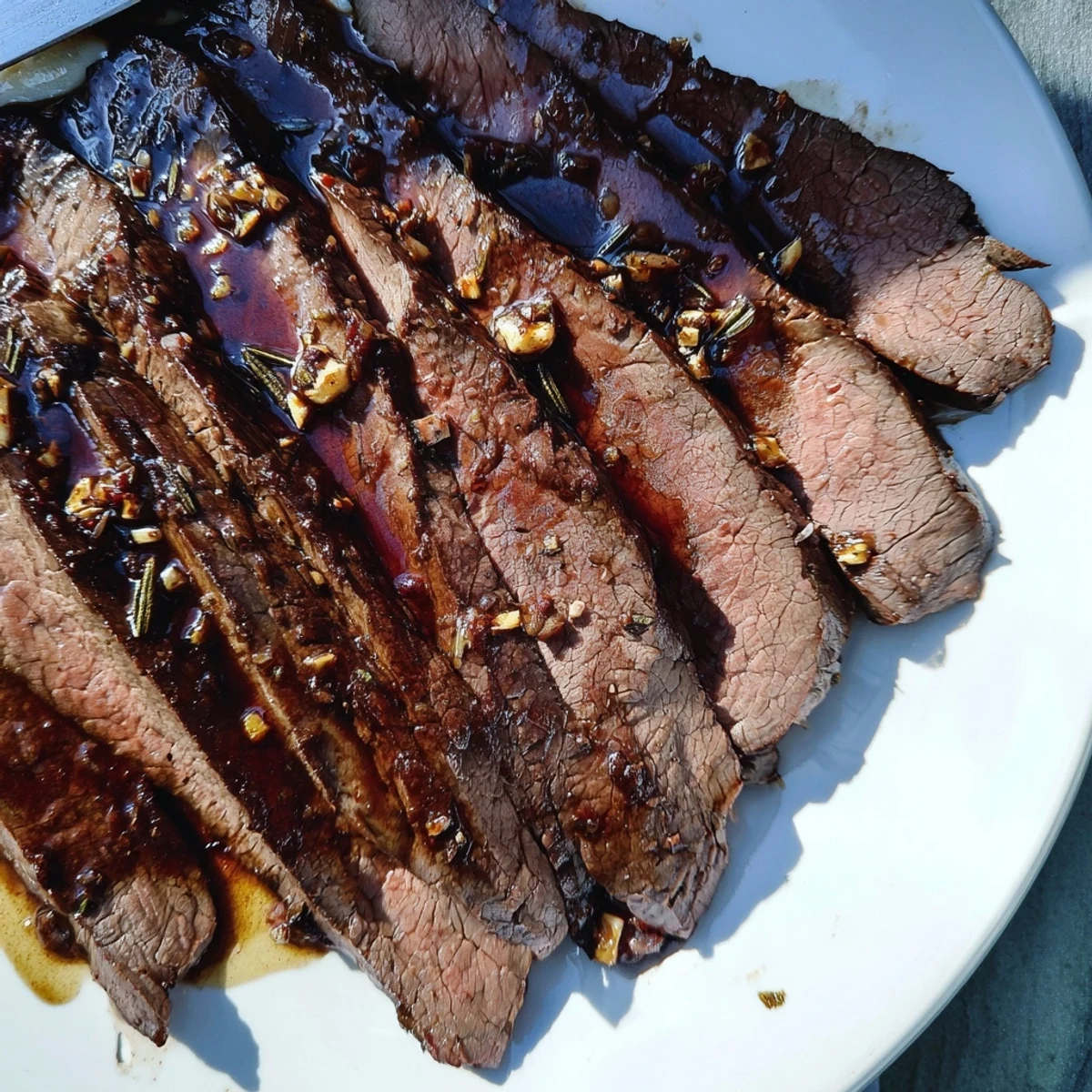 Slice of tender grilled flank steak over whipped feta beside charred zucchini for summer dinner. Balsamic Flank Steak With Grilled Zucchini And Whipped Feta