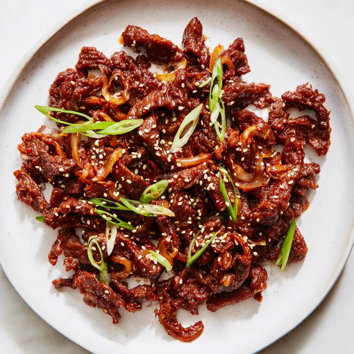 Shredded Korean beef in rich savory-sweet sauce served in fresh crisp lettuce wraps with vegetables