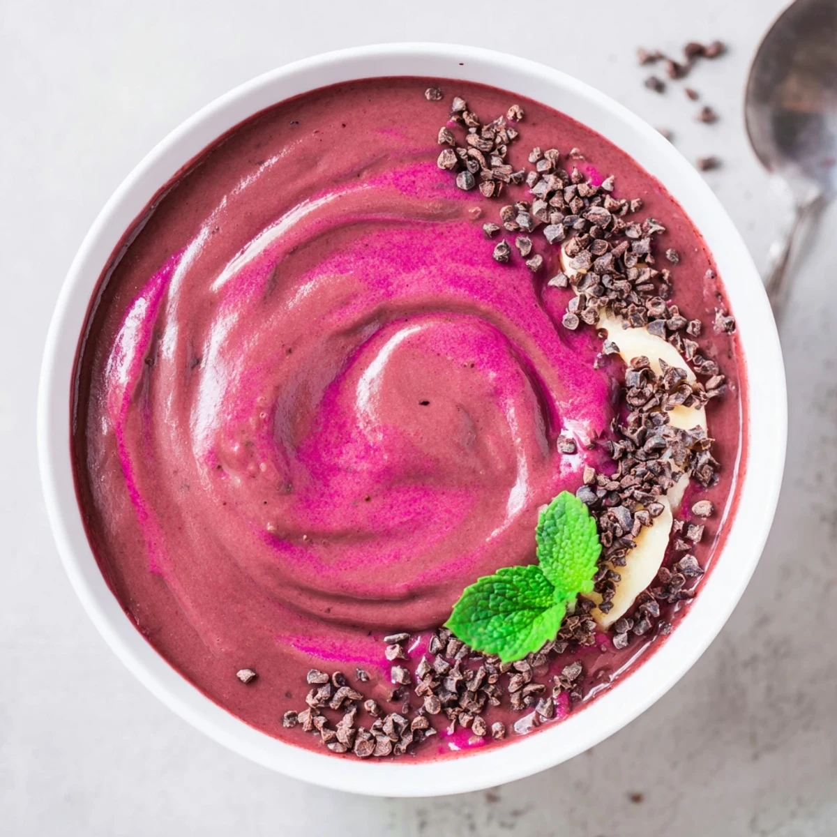 Chocolate Beet Smoothie in tall glass, velvety texture and earthy sweet aroma